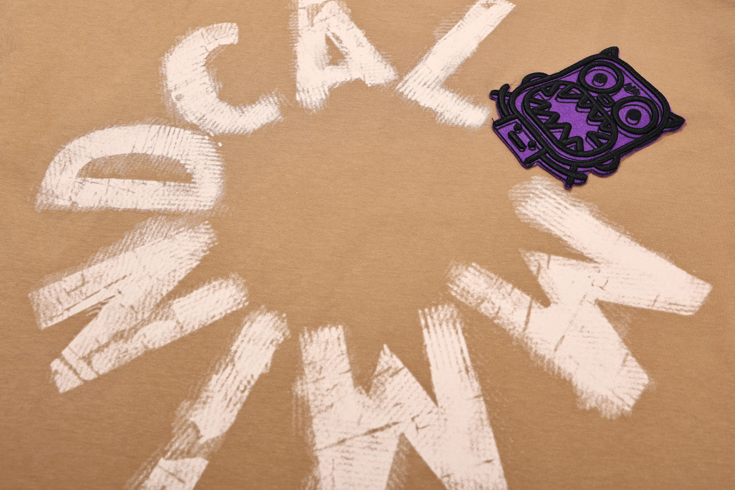 Rotating letter patch T-shirt